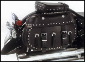 Mega studded Rendezvous saddlebags mounted with quick detach brackets